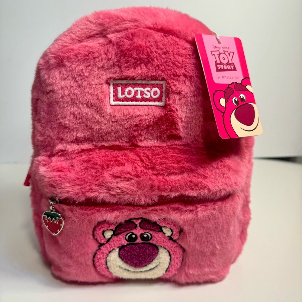 NWT. Disney’s Fluffy mini Backpack. Toy Story Lotso pink furry backpack